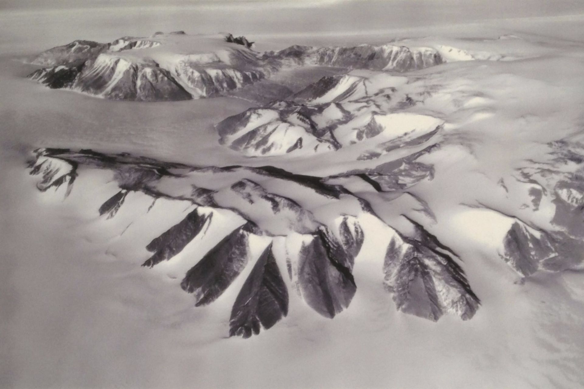 Greene Ridge, Antarctica, (83°12'S 157°10'E) named for Greeneridge founder Dr. Charles Greene. Aerial photo of Greene Ridge, Antarctica